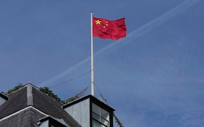 British officials charge 2 with spying for China
