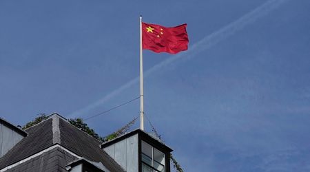 British officials charge 2 with spying for China