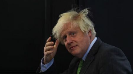 UK's Boris Johnson, who introduced voter ID rule, forgets his while voting
