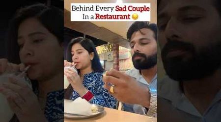 Sad Couple In a Restaurant 