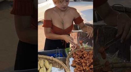 Beautiful Bangkok Lady Sells Fried Sausage At Local Market