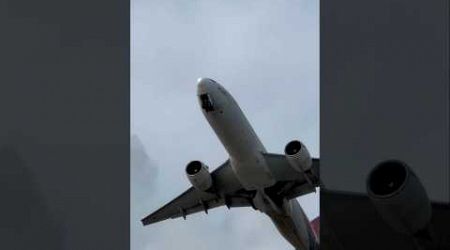 Red Wings Boeing 777-200ER roaring departure from Phuket International Airport