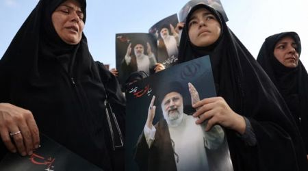 In divided Iran, president's death met by muted mourning and furtive celebration