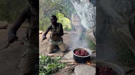 Hadzabe tribe bushmen still live old traditional cavemen lifestyle in the forest