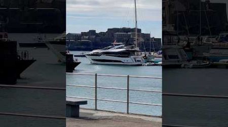 Glimpse of Glamour: Beautiful Yacht at St. Peter Port Harbour, Guernsey