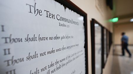 How will Louisiana's Ten Commandments classroom requirement be funded and enforced?