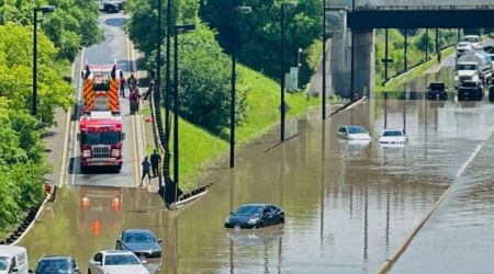 Torrential rains flood Toronto, causing power outages, traffic disruption
