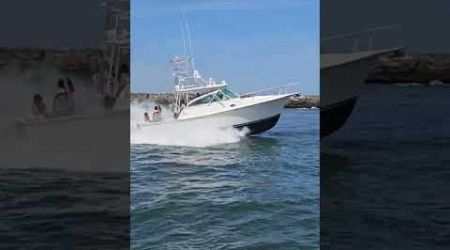 Yacht Is Cruising To Sea Through The Manasquan Inlet