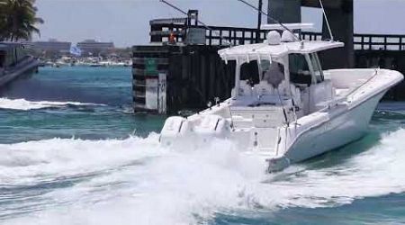 Jet Ski and Beautiful Yachts and fishing boat at Miami Haulover Inlet