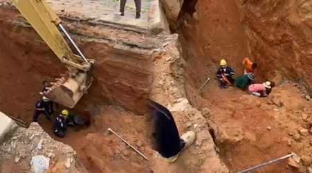 Buried worker rescued from deep, collapsed trench