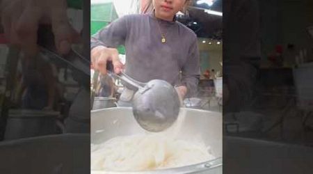 Thai Lady Making Rolled Rice Noodles in Five-spices Broth at Bangkok Street Food Thailand