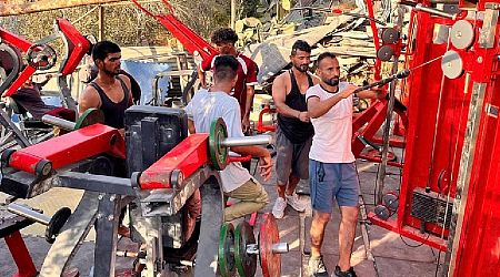 In gym salvaged from rubble, Gazans release anger on weight machines