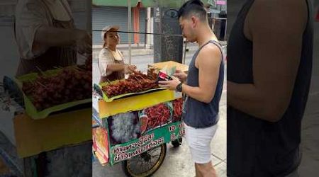 Purchasing street food in Bangkok, Thailand 