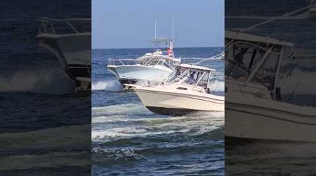 Grady White Cuts In Front Of The Yacht As It Enters The Inlet