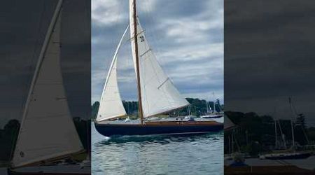 Herreshoff S boat whooshes past us in Bristol Harbor, where it was built over a century ago