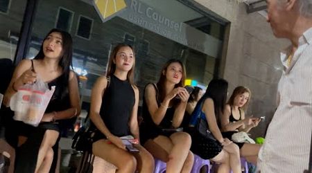 Thailand Bangkok nightlife street scenes. Thaniya, Patpong ladies look around!