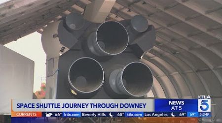 Crowds gather to see “Inspiration” space shuttle prototype travel through Downey streets