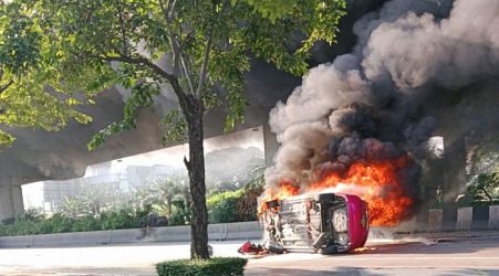 Bangkok taxi fire injures five