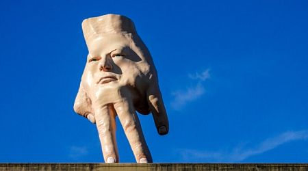 New Zealand city waves goodbye to its 'disturbing' giant hand