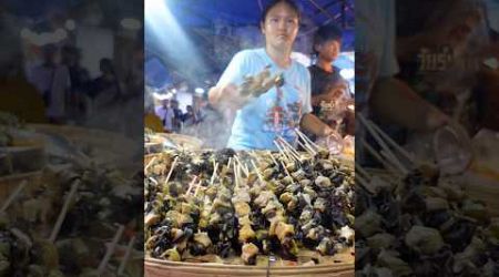 Steamed Golden Apple Snail with Thai Herbs at Bangkok Street Food Thailand