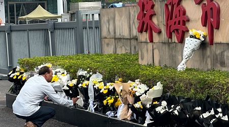 China clears memorial to mass killing victims as government scrambles to respond