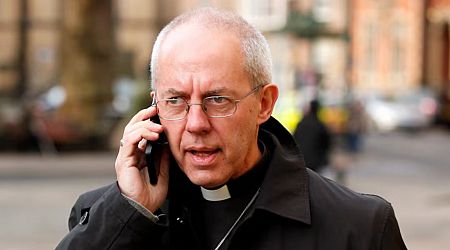 Church of England faces pressure over abuse scandal after Archbishop quits