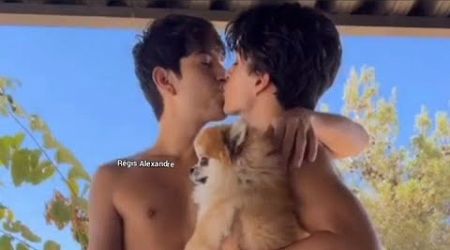 Gay Kiss travel with dog pet 