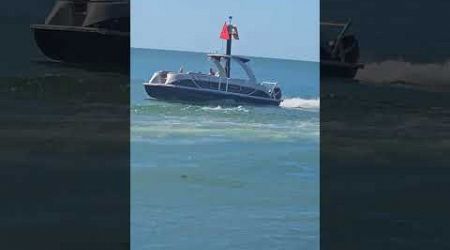 SMALL BOATS SPEEDING FUN AT THE VENICE FLORIDA JETTY