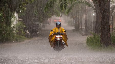 Landslide triggered by rain in Indonesia's Sumatra island kills 9 people in tourist bus 