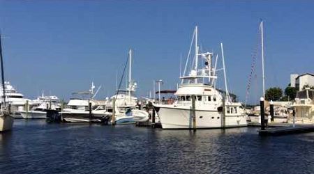 Sailboat docks next to Nordhavn 47