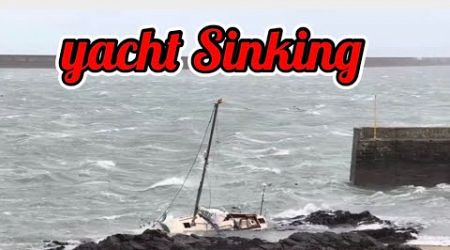 Sinking yacht Holyhead Harbour