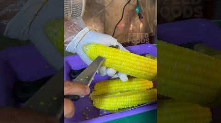 So good!! Uncle Corn cutting at night market in Thailand