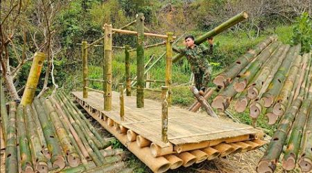 Building a yacht house frame with bamboo on a fish pond.