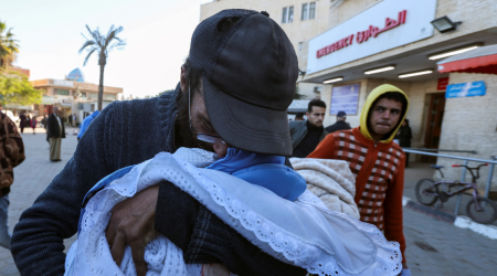 Displaced Gaza newborn freezes to death and twin fights for his life as rain floods tents