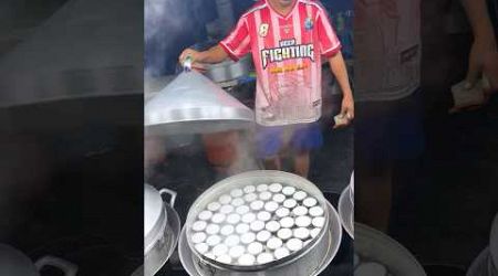 Thai Steamed Coconut Custard (Kanom Tuay) in A Festival in Bangkokฝ