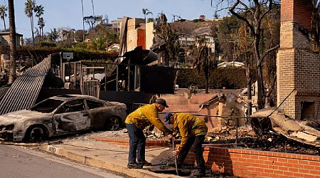 Los Angeles firefighters make progress as intense winds ease