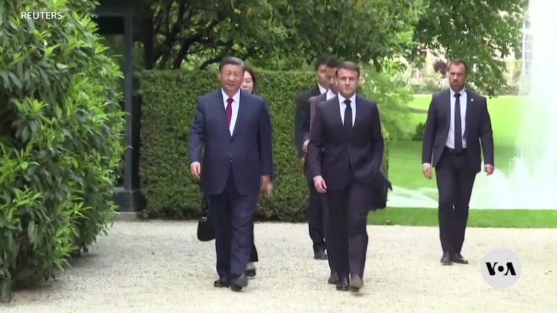 While visiting France, Xi offers few concessions over trade, Russia