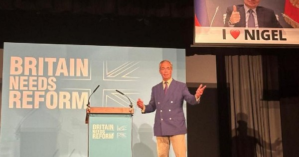UK Reform leader Farage speech interrupted by banner mocking Putin views