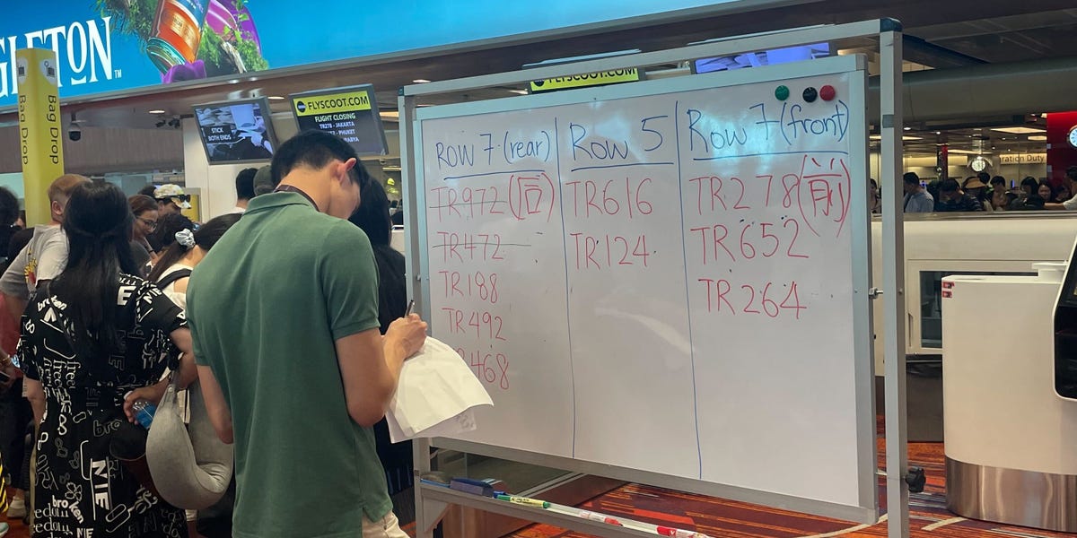 Some airports were forced to use whiteboards to handwrite flight information due to the global IT outage