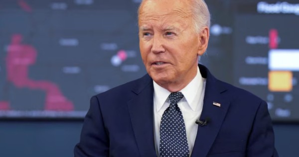 'I am running' Biden says, as he scrambles to reassure Democrats, campaign staff