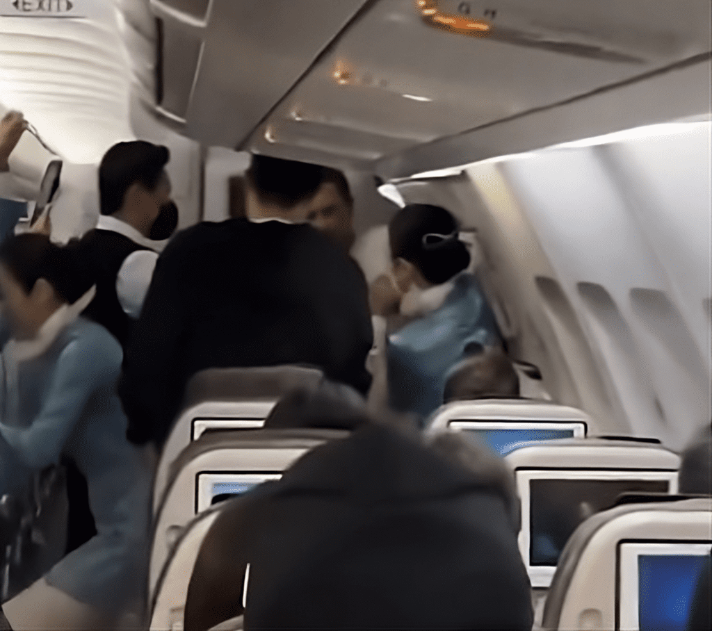 Watch: Crew’s Heroic, Flawless Response As Passenger Tries to Open Emergency Exit Midflight