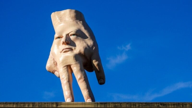 New Zealand city waves goodbye to its 'disturbing' giant hand