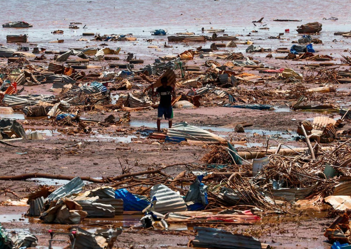 Angry residents of cyclone-hit Mayotte jeer Macron, plead for water