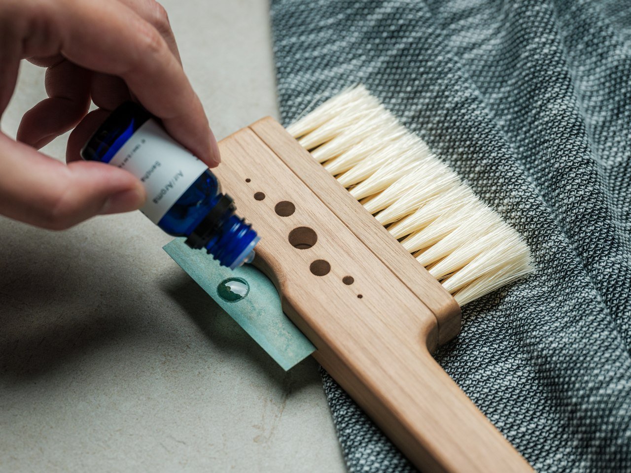 The Clothes Brush That Fragrances While It Cleans and Protects Your Wardrobe