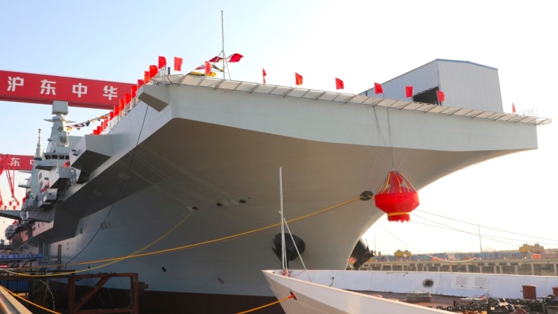 China unveils new assault ship and futuristic fighter jets  