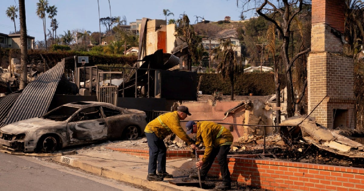 Los Angeles firefighters make progress as intense winds ease